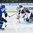 ZUG, SWITZERLAND - APRIL 26: Finland's Julius Nattinen #25 scores a first period goal on USA's Evan Sarthou #1 during gold medal game action at the 2015 IIHF Ice Hockey U18 World Championship. (Photo by Matt Zambonin/HHOF-IIHF Images)

